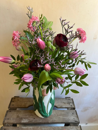 Pretty Vase Arrangement - A beautiful decorative vase (vase may vary) filled with a variety of fresh flowers and foliage in gorgeous cheerful colours. Flowers will be a seasonal mix